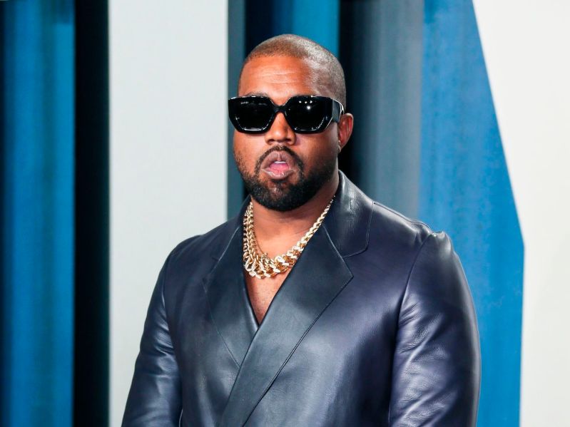 2020 photo of Kanye West in sunglasses and a black leather jacket