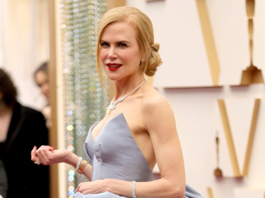 Nicole Kidman smiles in powder blue gown