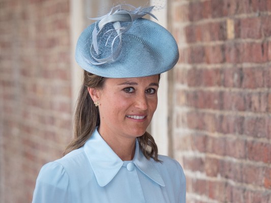 Pippa Middleton smiles in powder blue dress with matching hat