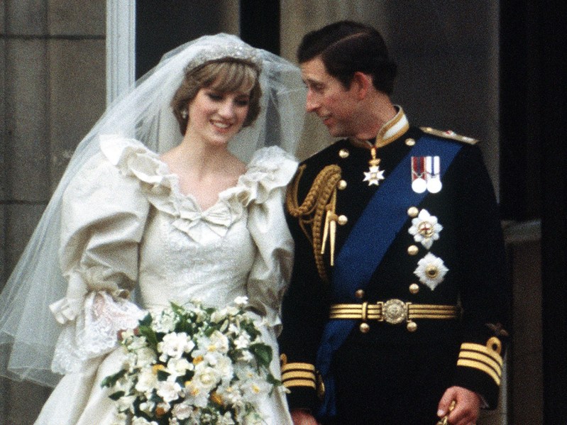 Princess Diana (L) standing next to Prince Charles on their wedding day
