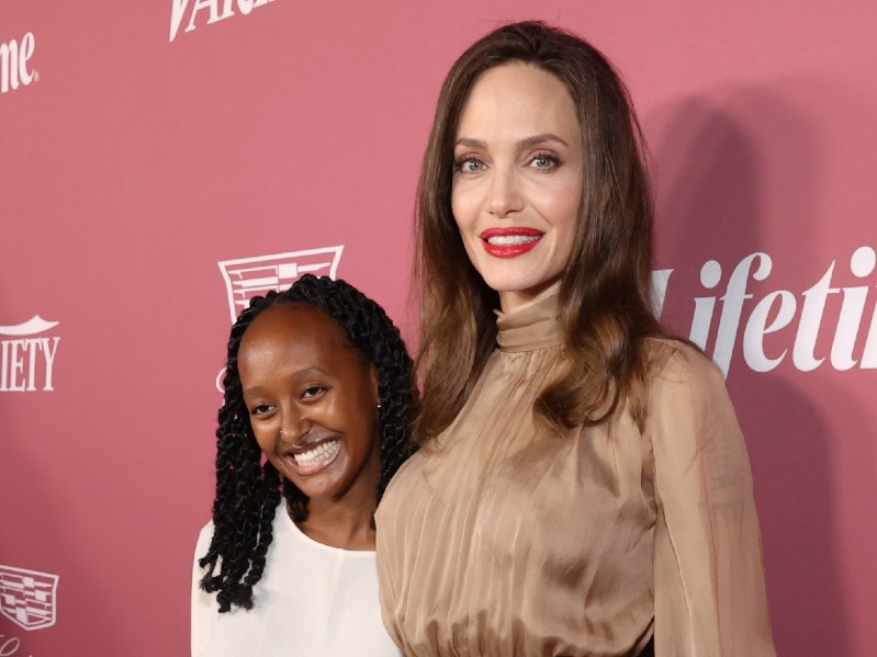 Zahara Jolie-Pitt and mom Angelina Jolie pose together on the red carpet