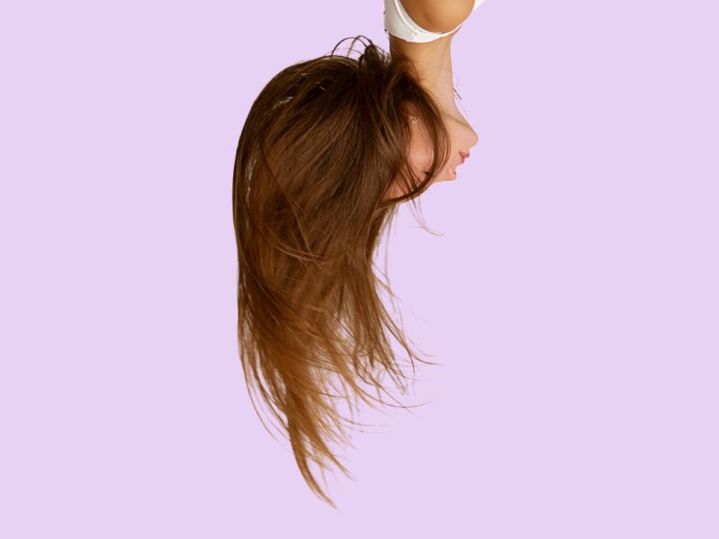 Woman with long hair upside down