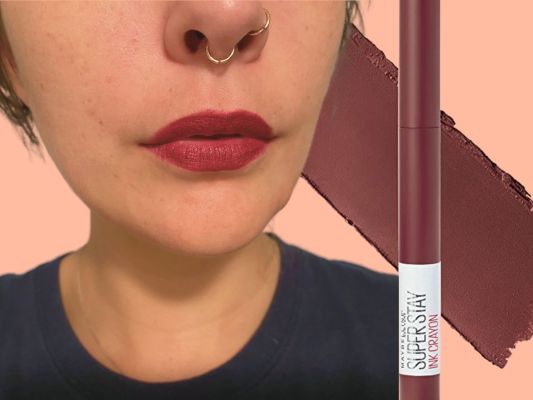 Woman with Maybelline Superstay Ink Crayon on lips, picture of product beside face