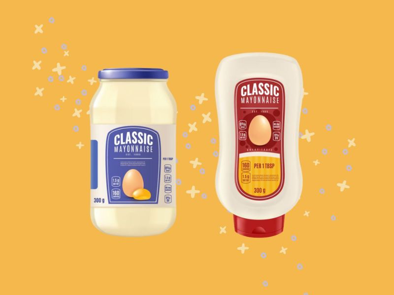 two jars of mayonnaise on a yellow background
