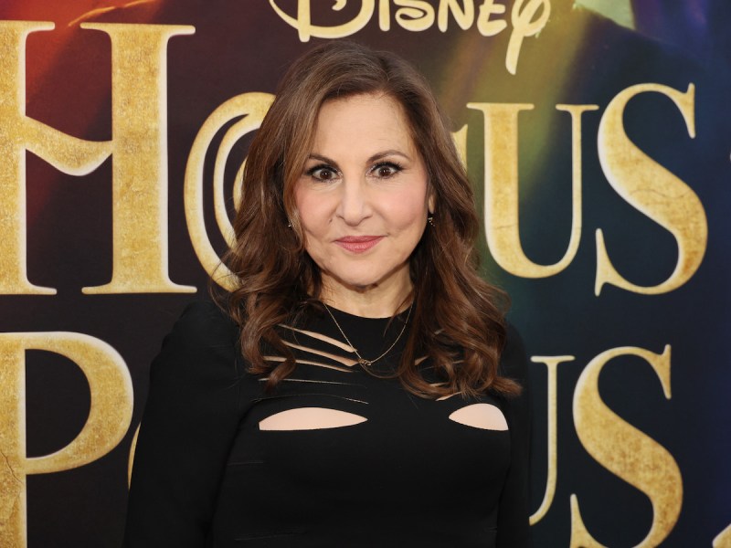 Kathy Najimy smiling in a black dress at the Hocus Pocus 2 premiere