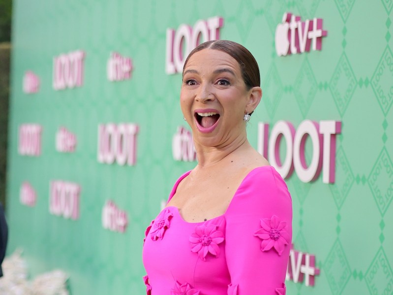 Maya Rudolph smiling in a pink dress
