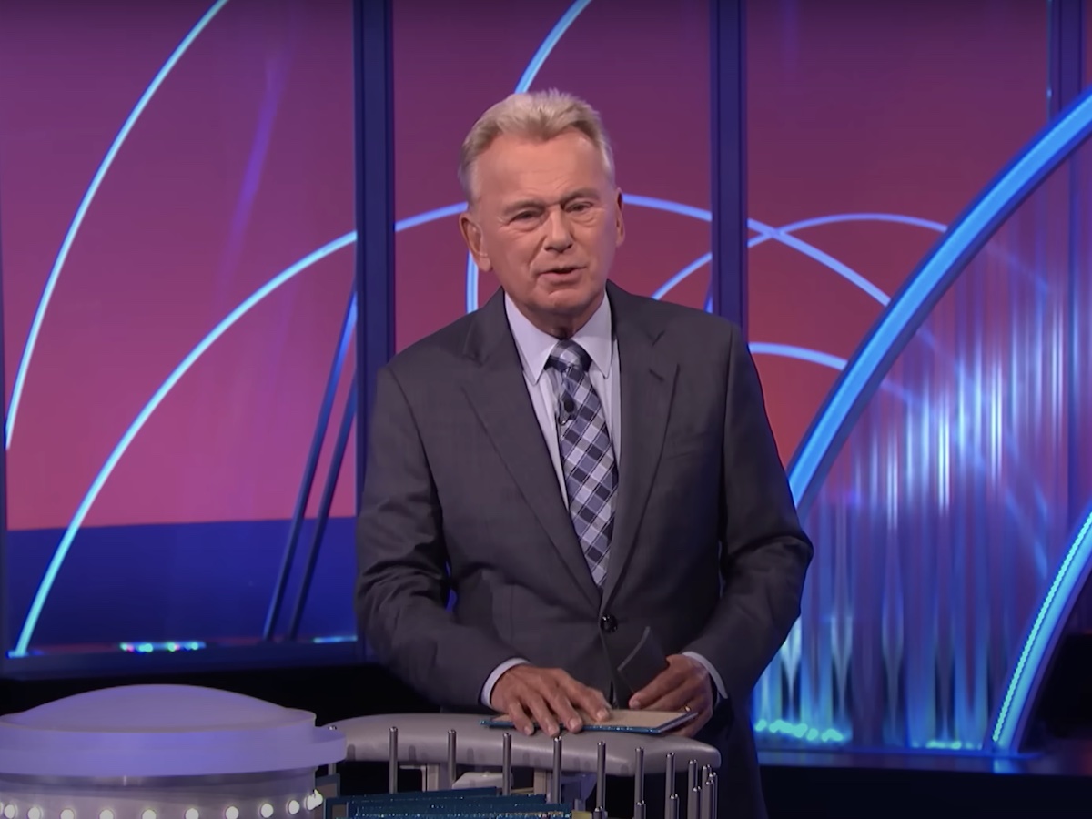 screenshot of Pat Sajak hosting the bonus round of Wheel of Fortune