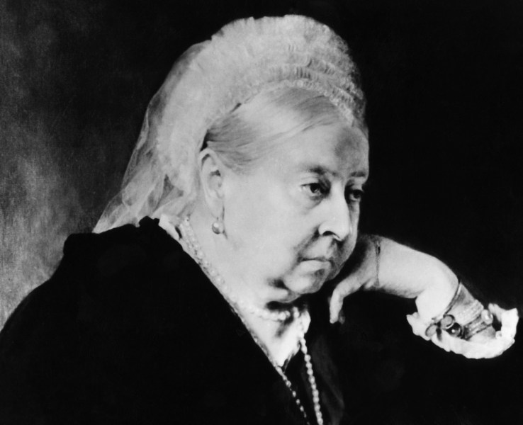 1897 black and white photograph of Queen Victoria in a black gown