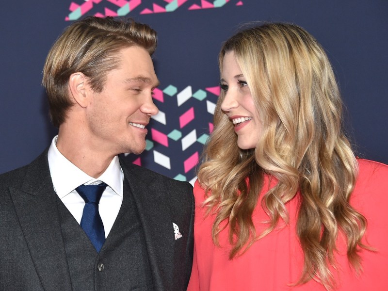 Chad Michael Murray (L) and his wife looking into each other's eyes and smiling