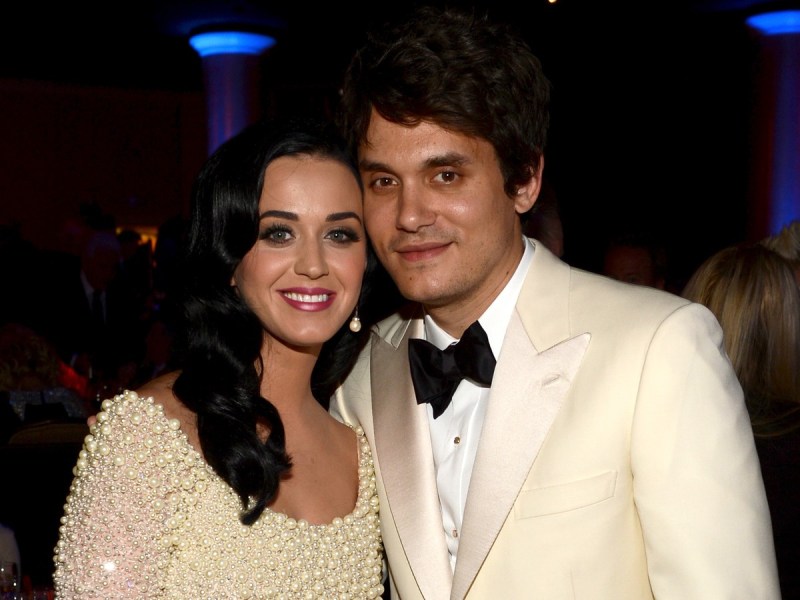 Katy Perry (L) and John Mayer smile together in cream-colored outfits