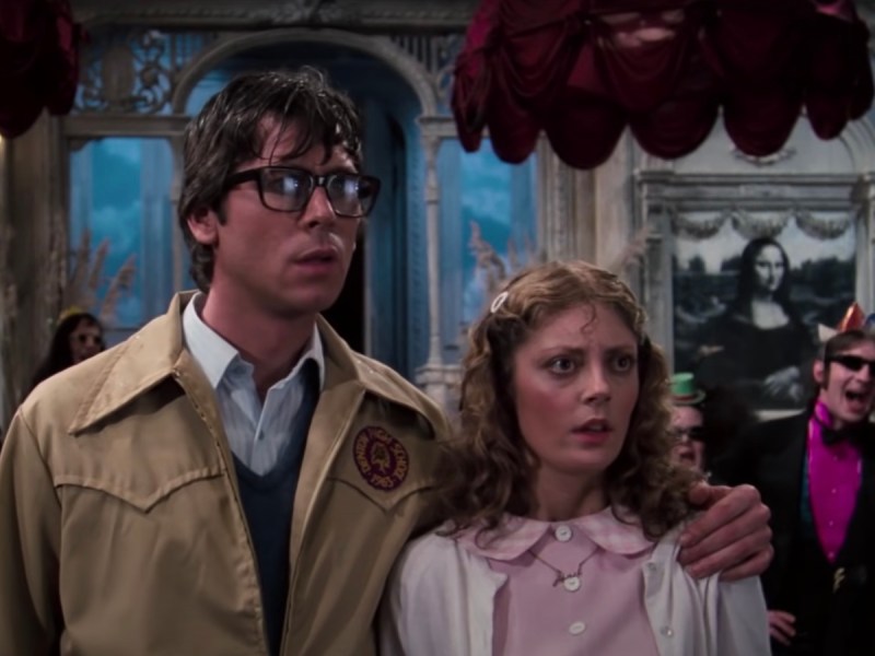 screenshot of Barry Bostwick and Susan Sarandon standing together