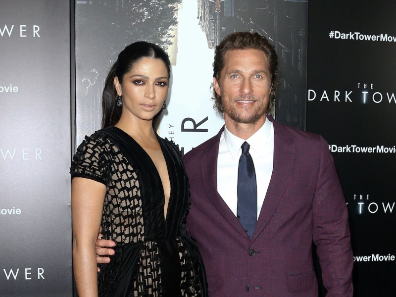 Matthew McConaughey smiling with wife Camila Alves at a Dark Tower event