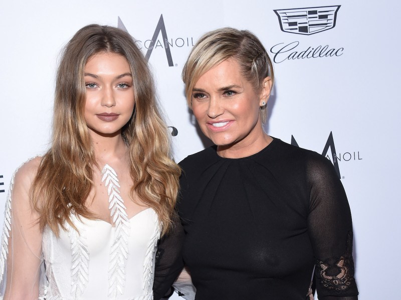 Gigi and Yolanda Hadid smiling with each other on the red carpet