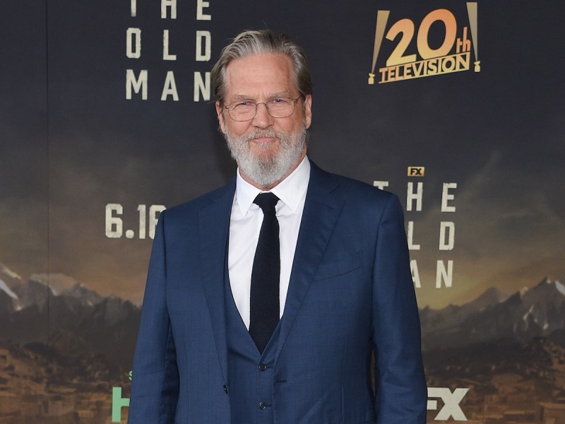 Jeff Bridges in a blue suit with a black tie