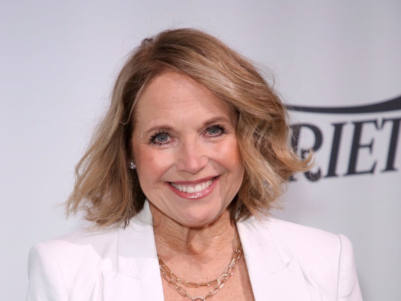 close up of Katie Couric smiling in a white blazer
