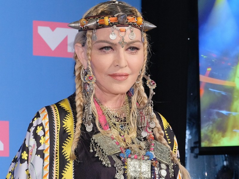 Madonna in patterned dress and headdress
