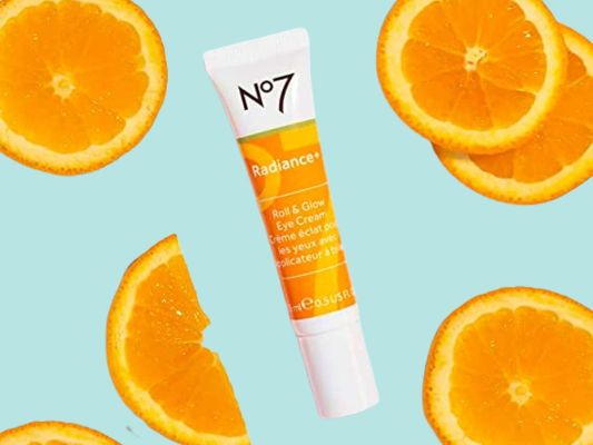 No7 radiance+ roll & glow eye cream surrounded by orange slices