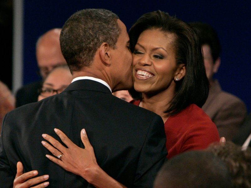 Michelle and Barack Obama embracing