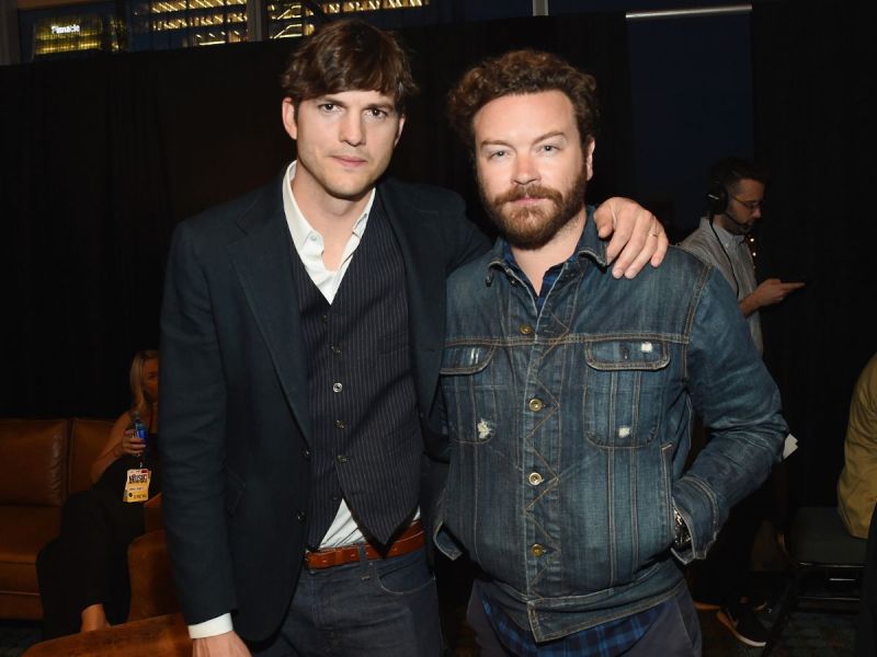 Ashton Kutcher with his arm around Danny Masterson.