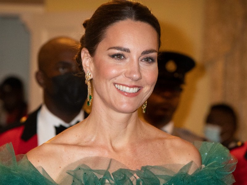 Kate Middleton smiles in off-shoulder green gown with feather detail
