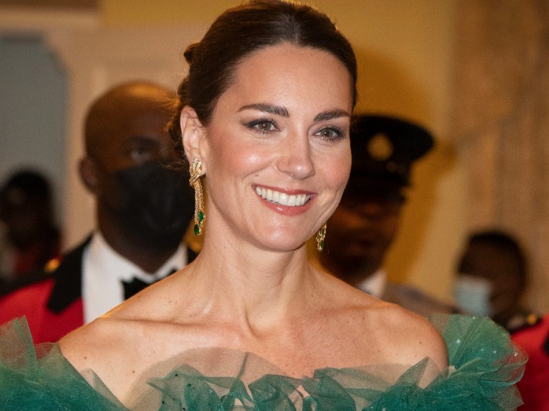 Kate Middleton smiles in off-shoulder green gown with feather detail