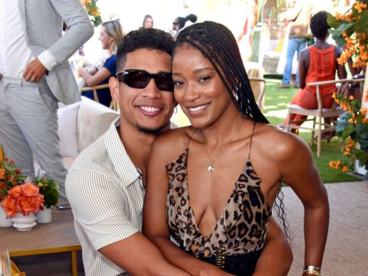 Keke Palmer sitting on her boyfriend, Darius Jackson's, lap