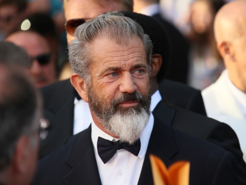 Mel Gibson in black suit and bow tie