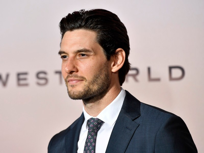 headshot of Ben Barnes in a navy suit at the Westworld premiere
