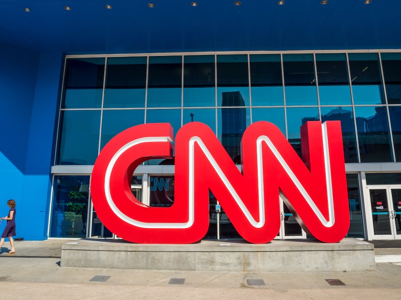 2014 photo of the CNN sign outside the Atlanta studio building of the network