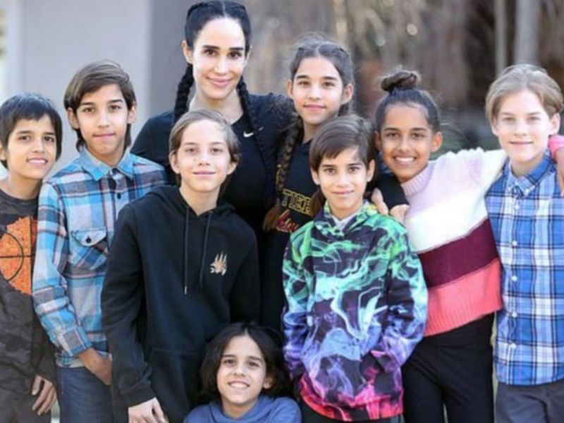 Octomom posing with her kids in March 2022