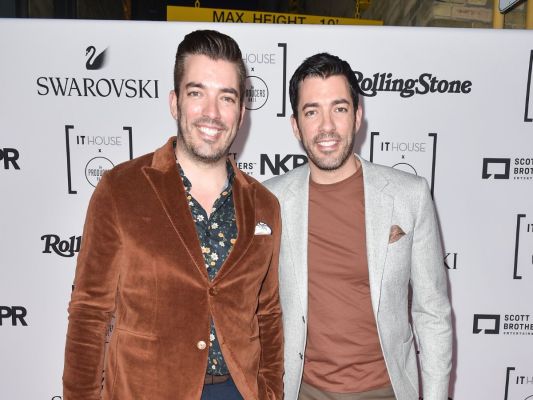 Jonathan and Drew Scott of the Property Brothers at a red carpet event.