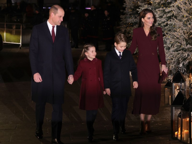 (L-R): Prince William, Princess Charlotte, Prince George, and Kate Middleton holding hands