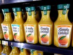 stock photo of Simply Orange orange juice on a grocery store refrigerated shelf