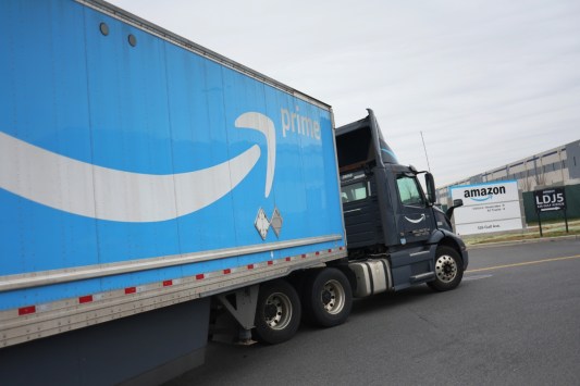 unbelievable-dashcam-video-shows-amazon-delivery-van-get-sliced-in-half-driver-miraculously-lives