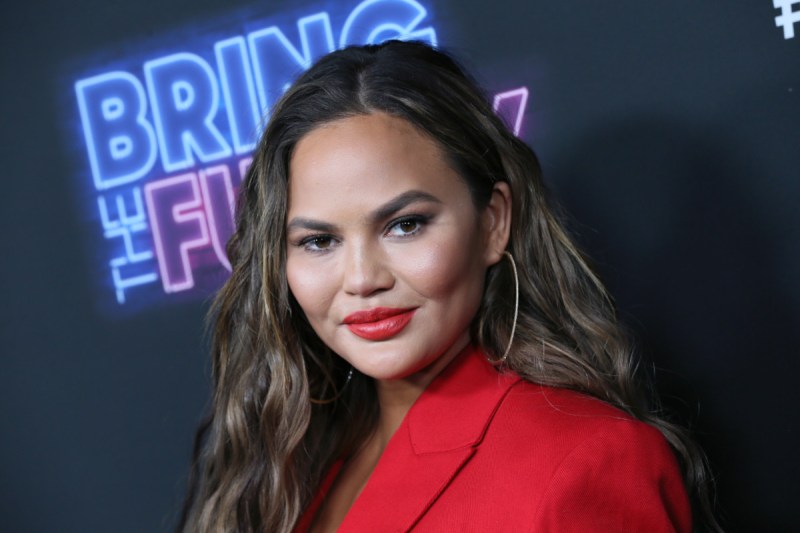Chrissy Teigen Shows Off 'Boob Lift Scars' With Sheer Dress at Beyoncé's Oscars Party