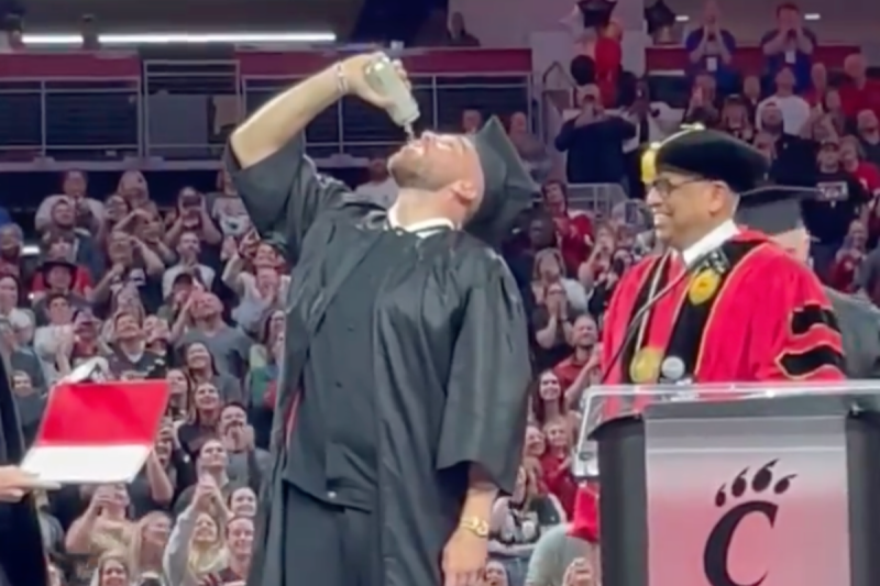 jason-and-travis-kelce-chug-beers-during-impromptu-graduation-ceremony