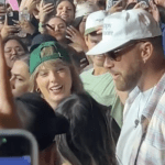 taylor-swift-and-travis-kelce-share-passionate-kiss-in-crowd-at-2024-coachella-festival