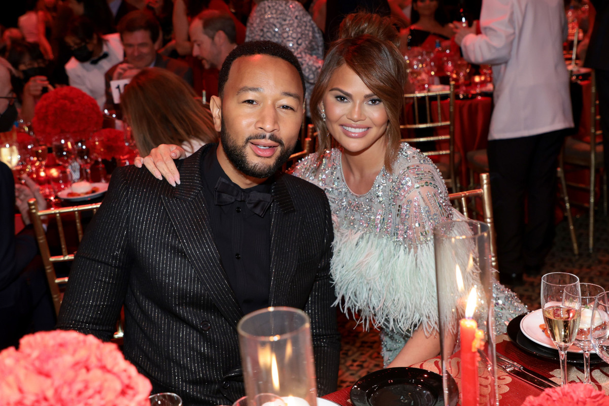 Chrissy Teigen and John Legend Kicked Women Out of Photo Booth at 'SI Swimsuit' Party, TikToker Claims