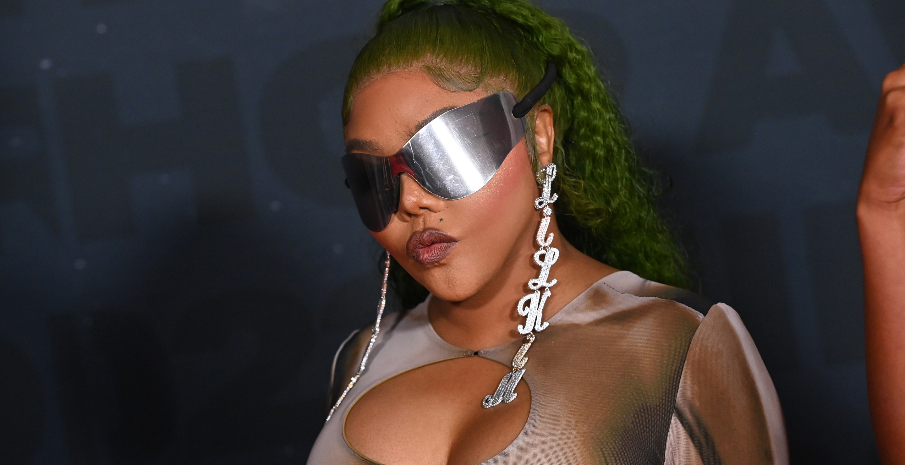 Woman Claims Lil Kim Dance Moves Saved Her During Apartment Shooting