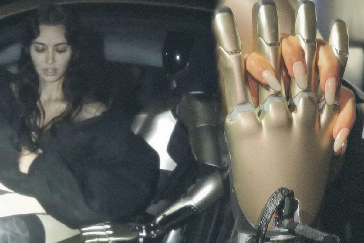 kim-kardashian-holds-hands-with-tesla-robot-in-strange-photo-shoot