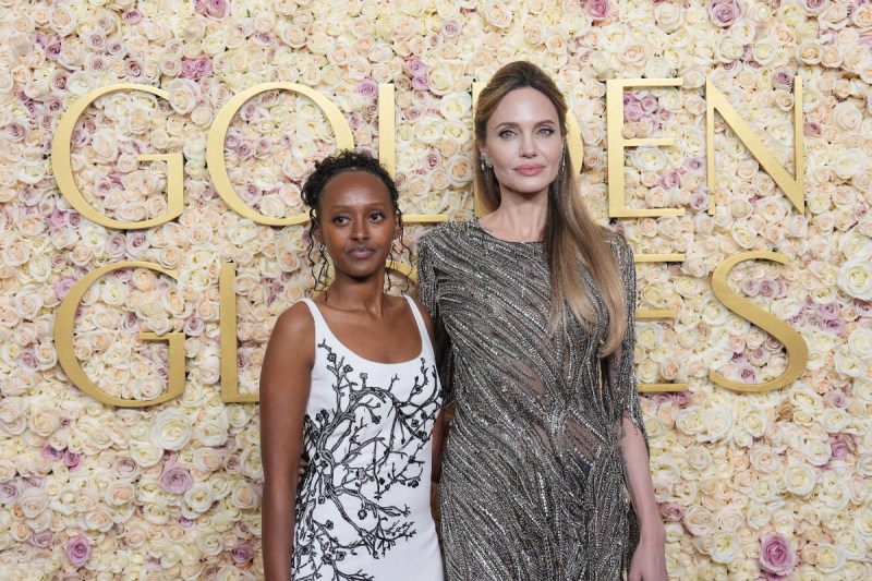 angelina-jolie-walks-the-2025-golden-globes-red-carpet-with-19-year-old-daughter-zahara-see-the-pics