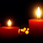 red candle vigil (photo: Smileus/Getty Images)