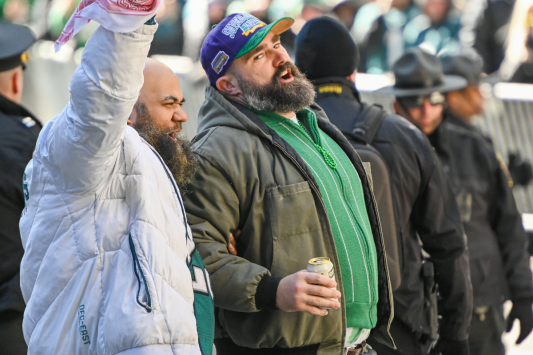Jason Kelce Kicks Off Super Bowl Parade with Epic Beer Chug with Fans