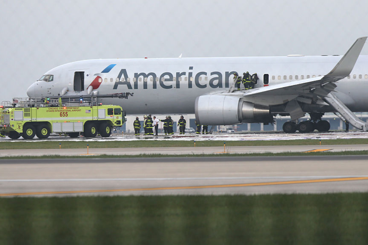 passengers-escape-onto-wing-after-american-airlines-plane-catches-fire-in-shocking-video