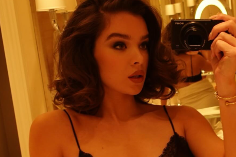 hailee-steinfeld-poses-in-lacey-nighttime-top-in-milan