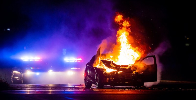 Shocking Video Shows Heroic Cop Save Fire Captain’s Daughter From Burning Car