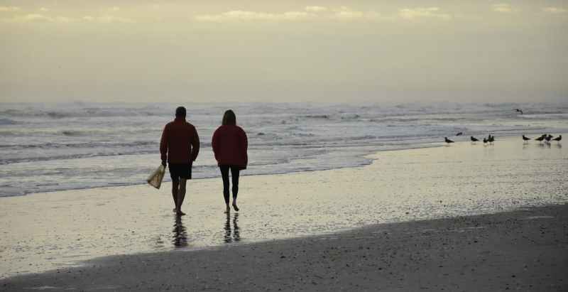 Couple Walking at New Smyrna Beach