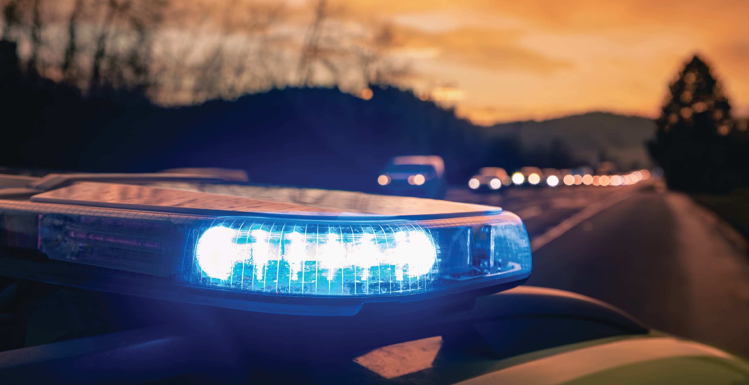 Blue Flashing Lights At Sunset