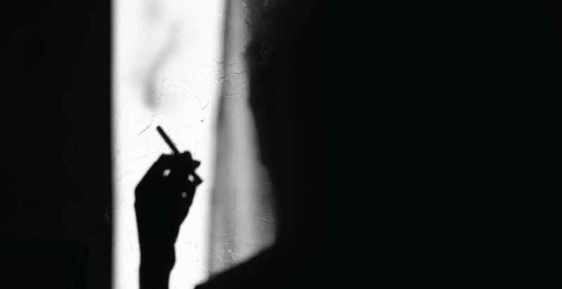 Man Smoking Cigarette