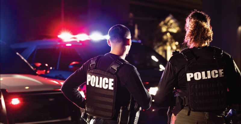 Police Officers At Crime Scene